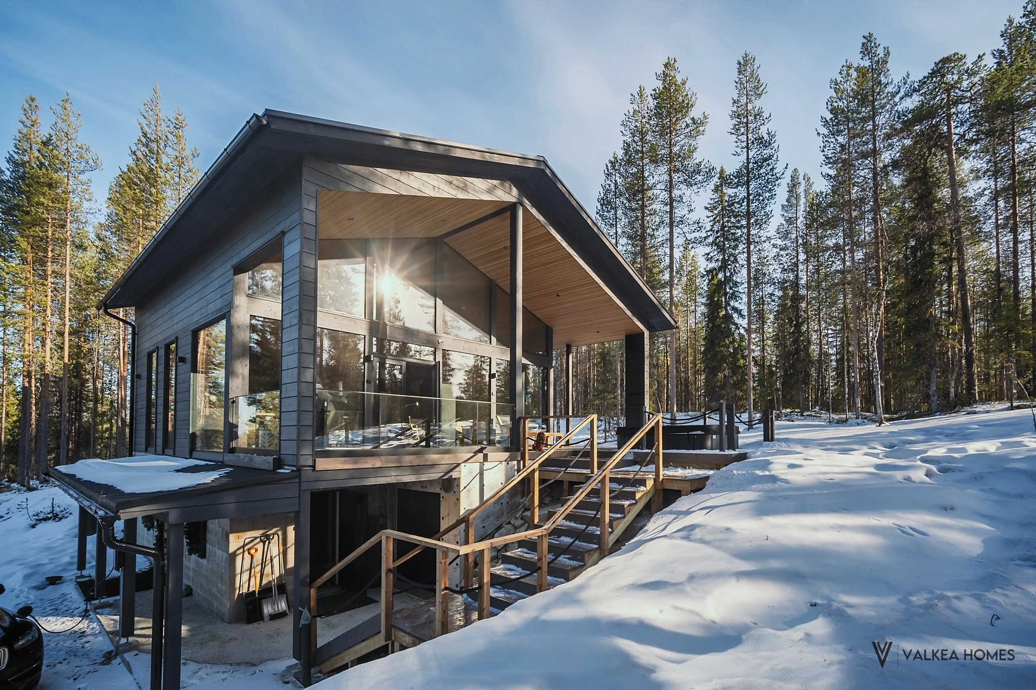 Modern holiday home in a snowy forest